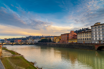  river arno crosses Florence at sunset