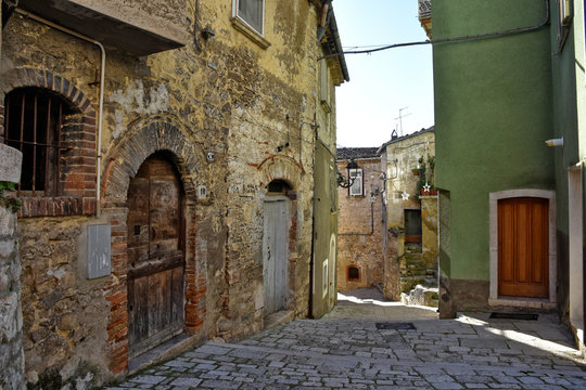 Castropignano, Italy, 12/24/2019. A narrow street between the old houses of a medieval village
