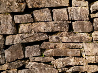 Light brown stone wall texture.