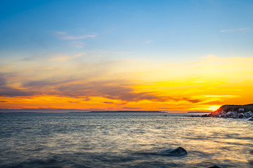 Long exposure seascape along Nova Scotia's rocky seacoast shoreline.