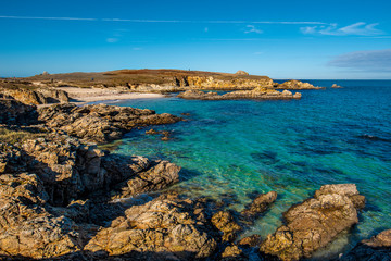 The view of rocky coastline and sandy beach in northwestern part of Hoedic island, the Cape  of...