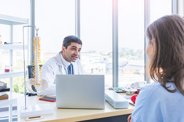 Doctor work consulting and examining patient woman for her health in seriously