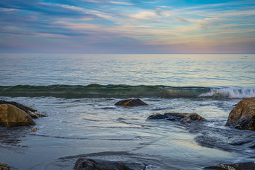Long exposure seascape along Nova Scotia's rocky seacoast shoreline.