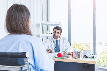 Doctor work consulting and examining patient woman for her health in seriously