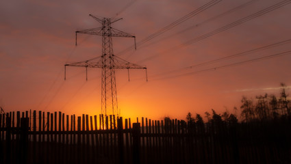 Fototapeta premium high voltage post,High voltage tower sky surise background