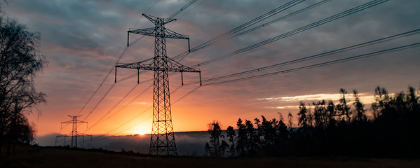 high voltage post,High voltage tower sky surise background