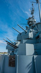 Close up pictures of old WW2 battleship during daytime