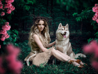 Art photo of a young girl in pink with a husky dog © Evgeniya Fedorova