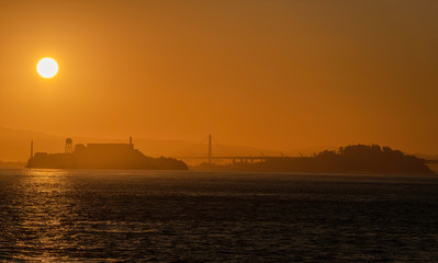 San Francisco Bay in silhouette Alcatraz Island and Bay bridge Treasure Island in view
