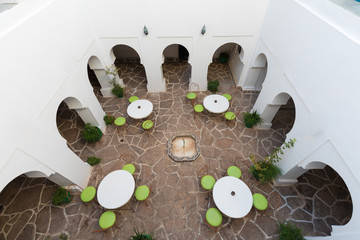 FES, MOROCCO december 2019 - Interior courtyard of the building for accommodation, Fez, Morocco, Africa View of a traditional Moroccan Riad Islamic indoor architecture