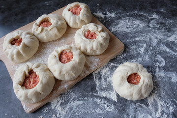 The process of making meat pies from dough with alternative gluten-free flour. Delicious homemade cakes. Slow baking, a useful home product.