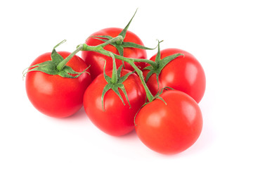 Fresh raw bunch tomatoes isolated on white background