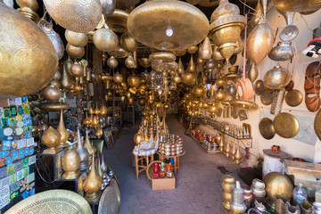 Fototapeta na wymiar Moroccan style hanging lamps at the market in medina. Lamps and souvenir shops, Marrakech. Traditional moroccan market, Morocco in Africa. Store in Marrakech or Fes taken in December 2019 Nice gift