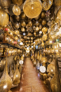 Moroccan style hanging lamps at the market in medina. Lamps and souvenir shops, Marrakech. Traditional moroccan market, Morocco in Africa. Store in Marrakech or Fes taken in December 2019 Nice gift