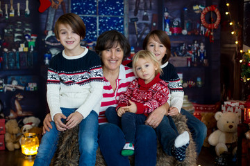Christmas family portirat at home with three generations
