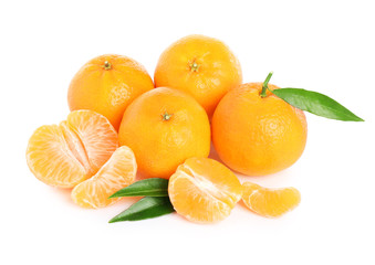 Fresh juicy tangerines with green leaves isolated on white