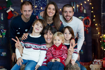 Christmas family portirat at home with three generations