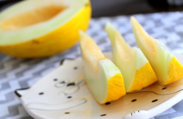  Melon. Yellow berry. The slices are juicy and sweet. Vitamins Healthy Eating.