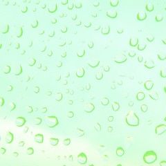 Abstract background texture of a drop of water on a glass of gently mint color. Place for text. Pattern for printing on paper, fabric, packaging, cover postcard. Digital illustration. 