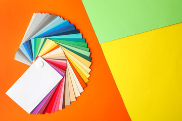 Color palette on bright background, top view. Space for text