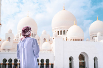 Arab man visiting the Grand Mosque in Abu Dhabi
