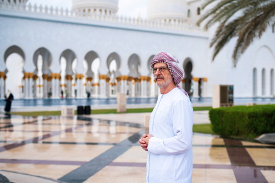 Arab man visiting the Grand Mosque in Abu Dhabi