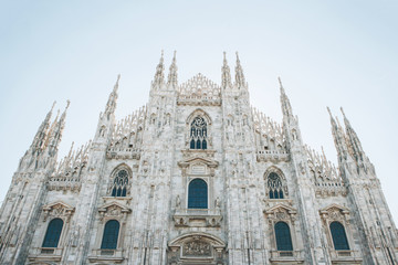 Beautiful view of the ancient Duomo Cathedral in Milan in Italy. It is one of the most popular tourist attractions in Italy.