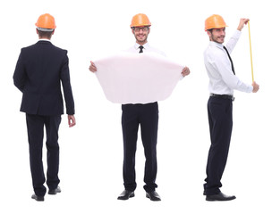 in full growth .a qualified architect in an orange helmet