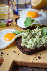 Brunch on Valentine's Day,  avocado toasts with fried egg