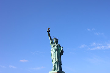 Statue of Liberty in front of blue sky © ramonr