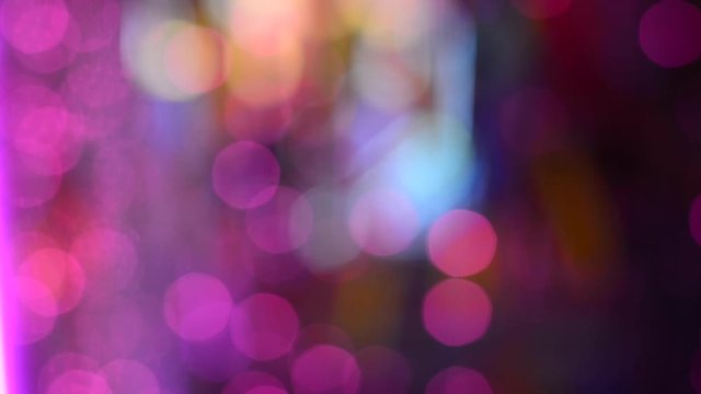 Pink bokeh on dark background,Background with shiny red particles, Beautiful bokeh light background,Red confetti shimmering with magical sparkling light,Seamless loop,Abstract Blurred Christmas Lights