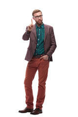 Fototapeta premium in full growth. serious hipster man showing a gesture of attention . isolated on white