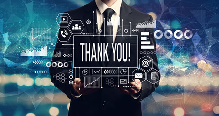 Thank you message with businessman holding a tablet computer