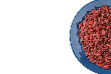 Dried goji berries on white table, top view. Space for text