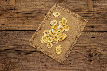 Dried slices of banana. Fruit snack, healthy eating concept