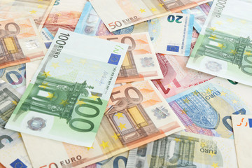 Euro banknotes as background, closeup. Money and finance
