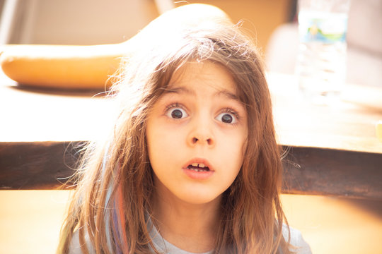 Face of confused 5 years old girl
