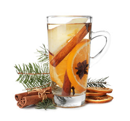 Aromatic mulled wine with cinnamon, dried orange and fir branch isolated on white