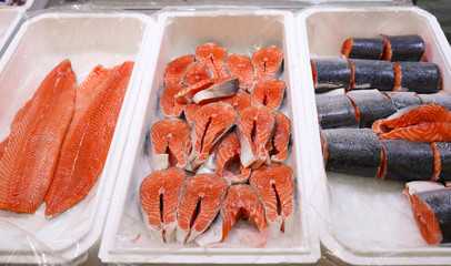 Fresh fish on display with ice at wholesale market