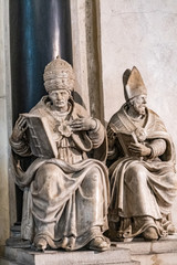 A statue in a small church in France