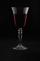 red wine on a black background