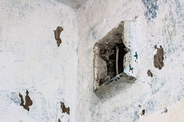 old ventilation shaft and grate ventilation system during repair work in the room