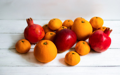Fruit. Orange, pomegranate, mandarin, mango. Fruit on a white background. Eco-friendly fruits, zero waste.