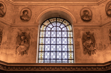 A stained glass window in a french church