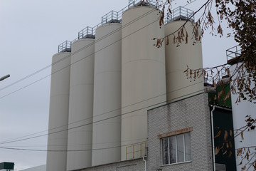 Industrial landscape. Large metal factory facilities for the production of products.