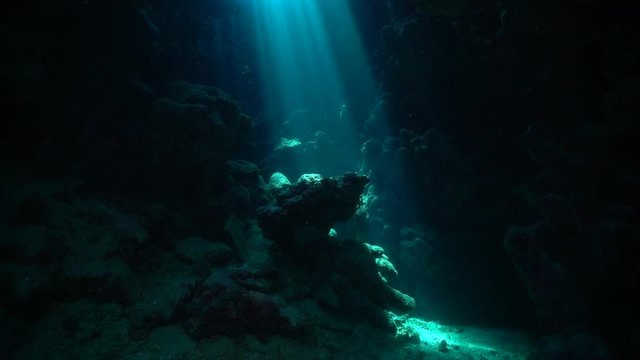 Diving through underwater cave 3
