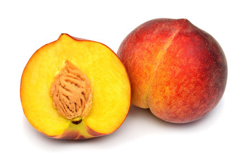 Peach fruit whole and half isolated on white background. Perfectly retouched, full depth of field on the photo. Flat lay, top view
