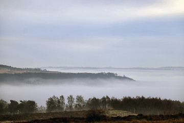 Fototapeta na wymiar Low mist filling the Derwent Valley, Hathersage, Derbyshire