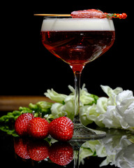 strawberry in glass of wine