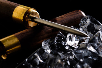 bottle of wine and corkscrew